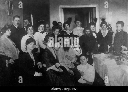 Rasputin surrounded by his admirers in St. Petersburg, 1914 Stock Photo