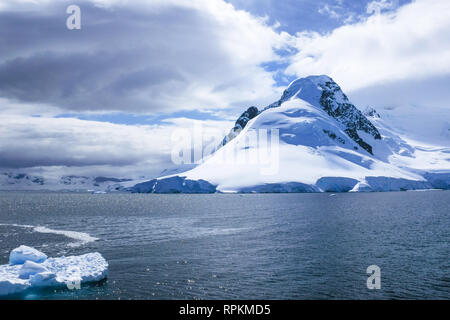 Scene of icebergs, penguins, seals, snow and ice in Antarctica, world's southernmost continent Stock Photo