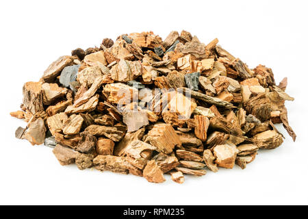 Shredded tree bark used for gardening isolated on a white background. Stock Photo