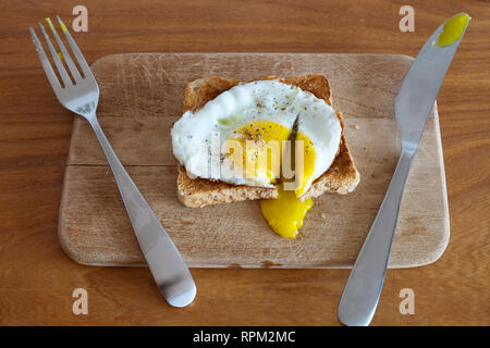 Fried egg on toast Stock Photo