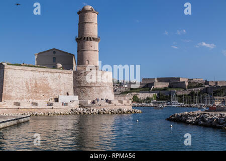 A view of Fort Saint Jean, one of the two forts guarding the entrance to the Old Port (Vieux Port) of Marseille in France, as well as the port entry. Stock Photo