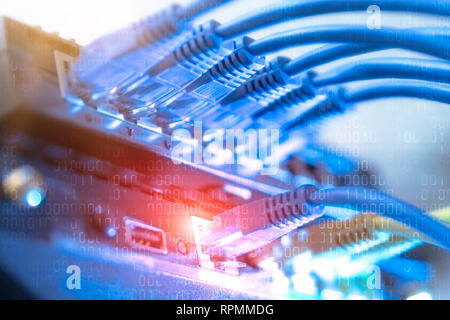 Network infrastructure, switch or router socket, cable connections. Ethernet, wired transmission, data center concept Stock Photo