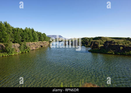 Scenic View Of Volcanic Landscape At Dimmuborgir Against Sky Stock Photo