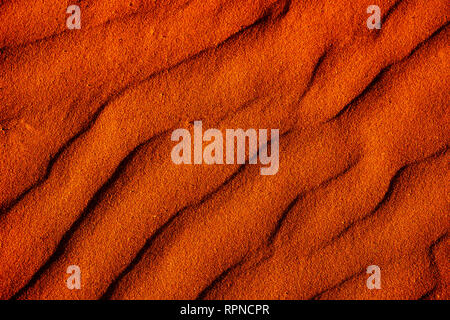 closeup of a sand background with a natural wavy pattern Stock Photo