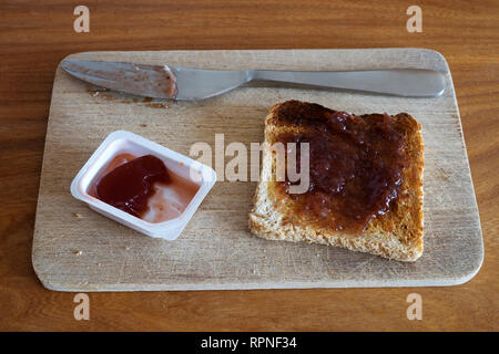 Strawberry jam on toast Stock Photo