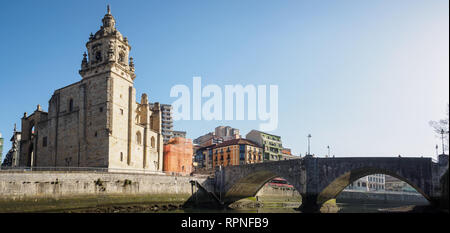 The Ribera market and the church of San Anton of Bilbao seen from the river. Basque Country Stock Photo