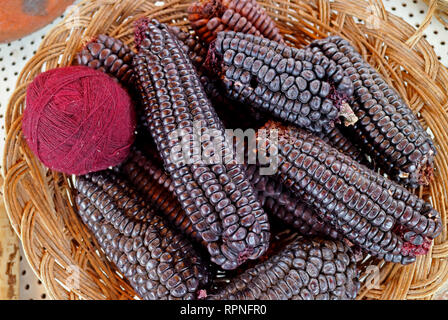 Magenta Purple Peruvian Alpaca Wool Yarn Balls Dyed from Purple Corn at Chinchero, the Andes Village in Cuzco Region of Peru Stock Photo