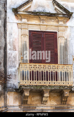 The  ancient window on stone wall, for background Stock Photo