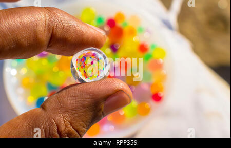colorful balls reflection in hydrogel ball. Stock Photo