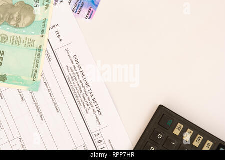 New Indian ITR-5 Income tax Form with indian currency and PAN or Permanent Account Number on isolated background. Stock Photo