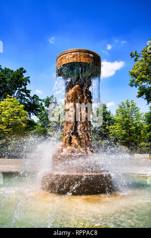 Famous fountain in the historic spa park in Bad Nauheim, Germany,  The fountain was created by Richard Hess - The motif of the fountain: Adam and Eve Stock Photo