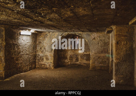 Old grunge vintage Basement interior with bricks walls and floor. Stock Photo