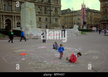 Glasgow, Scotland, UK 22nd, February, 2019 Community Lunch For Climate  c Extinction Rebellion climate group continues the ongoing protest against climate change that saw last weeks school strike by children in the same place George square. The idea is for people to have their lunch in the square every day to  show support for the ongoing protest. Children were encouraged to chalk their feelings for the movement against the planets poisoning as it is their future.  Gerard Ferry/Alamy Live News Stock Photo