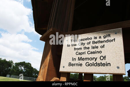 Bettendorf, Iowa, USA. 23rd June, 2016. Officials from the City of Bettendorf, Isle of Capri and Goldstein family members attended a short dedication ceremony for the gazebo that was donated to the City by the Isle of Capri, in memory of Bernie Goldstein Thursday, June 23, 2016. The structure was located on the Isle property until the construction of the new land based casino. The gazebo was relocated to Middle Park in May. Credit: Kevin E. Schmidt/Quad-City Times/ZUMA Wire/Alamy Live News Stock Photo