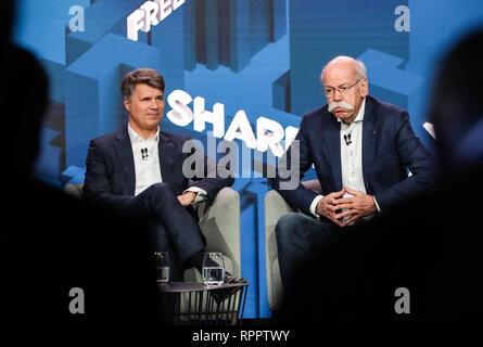 Berlin, Germany. 22nd Feb, 2019. Harald Krueger (L), management board chairman of BMW, and Dieter Zetsche, chairman of the board of management of Daimler, attend a press conference in Berlin, capital of Germany, on Feb. 22, 2019. Daimler and BMW, two German luxury carmakers, revealed on Friday their plans to invest more than one billion euros (1.13 billion U.S. dollars) in the establishment of a new joint car sharing business. Credit: Shan Yuqi/Xinhua/Alamy Live News Stock Photo