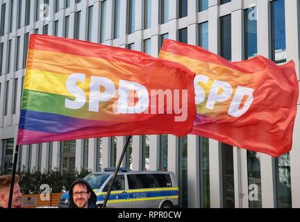 Munich, Bavaria, Germany. 23rd Feb, 2019. The pro LGBT variants of the German SPD party flags. In reaction to a conference by the controversial Demo fuer Alle (Demonstration for All) group, citizens of Munich held their own protest in the Riem district of the city. The Demo fuer Alle group has been vocal against international legal actions to strengthen the rights if children. Further themes include opposition to abortion. Credit: Sachelle Babbar/ZUMA Wire/Alamy Live News Stock Photo