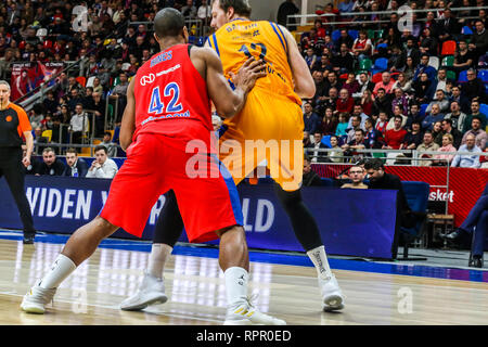 February 21, 2019 - Moscow, Moscow, Russia - Ondrej Balvin, #12 of Herbalife Gran Canaria and #42 Kyle Hines of CSKA Moscow seen in action during the game of CSKA Moscow against Herbalife Gran Canaria in Round 23 of the Turkish Airlines Euroleague game of 2018-2019 season. CSKA Moscow beat Herbalife Gran Canaria, 107-85. (Credit Image: © Nicholas Muller/SOPA Images via ZUMA Wire) Stock Photo