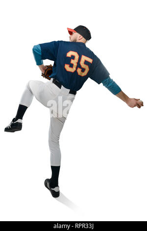 Baseball pitcher in action Stock Photo