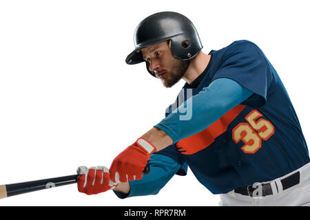 Baseball player hitting a ball Stock Photo