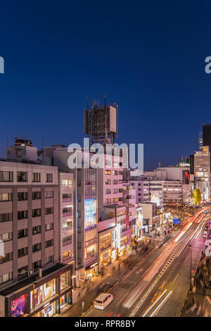Bird’s view of the Japanese youth culture fashion’s district crossing intersection of Harajuku Laforet named champs-élysées in Tokyo, Japan at night. Stock Photo
