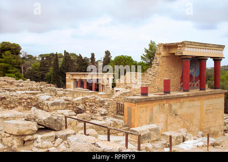 View on Red columns and ruins of  Minoan Knossos Palace. Wide shot. No people. Heraklion, Crete Island, Greece. Stock Photo