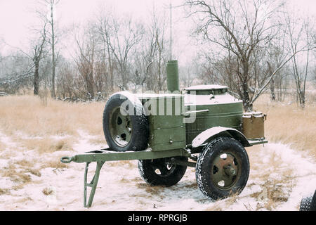 Russian Soviet World War II Field Kitchen In Winter Forest. WWII Equipment Of Red Army. Mobile Kitchen, Mobile Canteens Or Food Truck Stock Photo