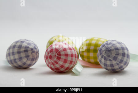 Five colourful textile Easter eggs on white background Stock Photo