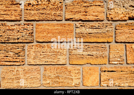 Detail of the house wall. Background made of cut shell rock Stock Photo