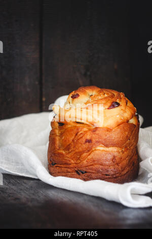 Easter cake kranch with icing sugar on a dark background. Stock Photo