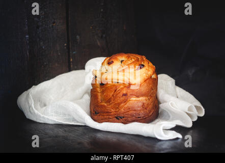 Easter cake kranch with icing sugar on a dark background. Stock Photo