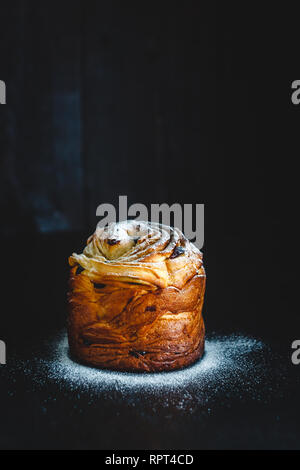 Easter cake kranch with icing sugar on a dark background. Stock Photo