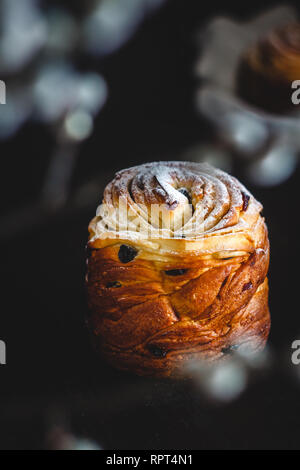 Easter cake kranch with icing sugar on a dark background and with willow flowers. Stock Photo