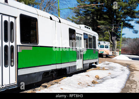 Two old trolleys located at the trolly seashore trolley museum in Kennebunkport Maine on a sunny winter day. Stock Photo