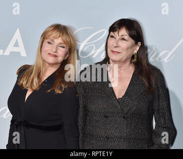 LOS ANGELES, CA - FEBRUARY 21: Rebecca De Mornay (L) and Anjelica Huston arrive at the Hollywood For Science Gala at Private Residence on February 21, Stock Photo