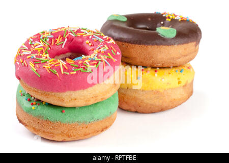 pile of glazed donuts isolated on white background Stock Photo