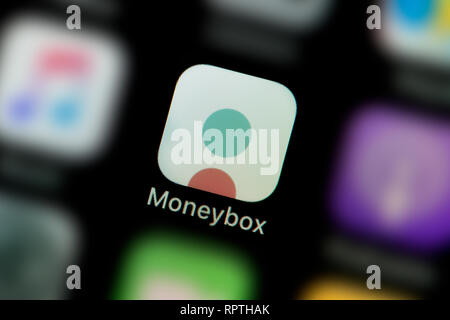 A close-up shot of the Moneybox app icon, as seen on the screen of a ...