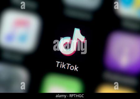 A close-up shot of the TikTok app icon, as seen on the screen of a smart phone (Editorial use only) Stock Photo