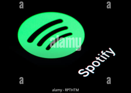 A close-up shot of the Spotify app icon, as seen on the screen of a smart phone (Editorial use only) Stock Photo