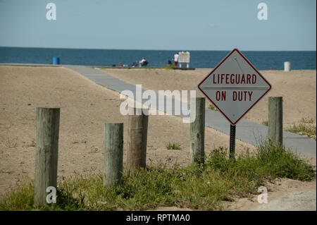 Lifeguard on duty sign on Walnut Beach on  Lake Erie in Ashtabula, Ohio Stock Photo