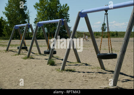 Tire swings on Walnut Beach, Lake Erie, Ashtabula, Ohio Stock Photo