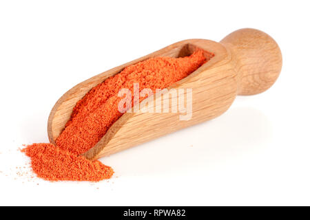 Ground paprika in a wooden scoop isolated on a white background Stock Photo