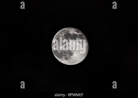 Full moon against a black night sky Stock Photo