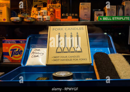 Fork Candles cardboard box and packaging in an ironmongers shop window Stock Photo