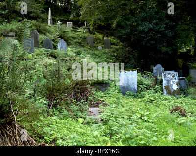 Overgrown graveyard at Minster Church, Boscastle, Cornwall, UK Stock Photo