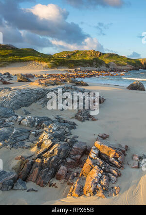 Rock formations at sunrise at Uig Sands on the Isle of Lewis, Outer Hebrides, Scotland Stock Photo