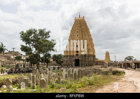 The Shri Virupaksha Temple in Hampi was built by Lakkan Dandesha and is dedicated to Lord Shiva. Its a Temple still in use. Stock Photo