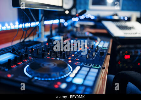 Audio remote control panel in the recording studio, nobody. Professional sound mixing technology. Electronic equalizer console Stock Photo