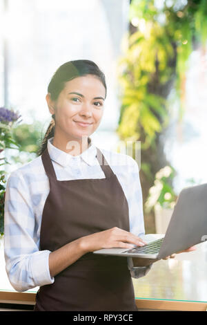 Girl with laptop Stock Photo