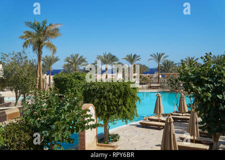 Sharm El Sheikh, Egypt - February 9, 2019: Five-star The Grand Hotel with palms and swimming pool in summer Stock Photo