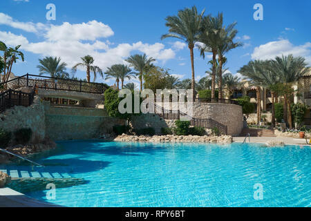 Sharm El Sheikh, Egypt - February 9, 2019: Five-star The Grand Hotel with palms and swimming pool in summer Stock Photo